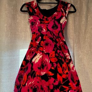 Girls size 8 flower print dress. Rare Editions dress with hidden side pockets.